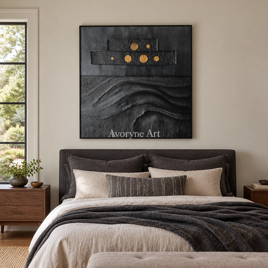 Woven Sonata dark mineral relief wall art with a black frame above a bed in a bedroom