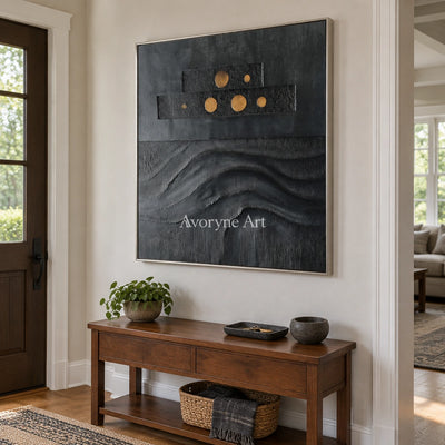 Woven Sonata dark mineral relief wall art with a silver frame in an entryway