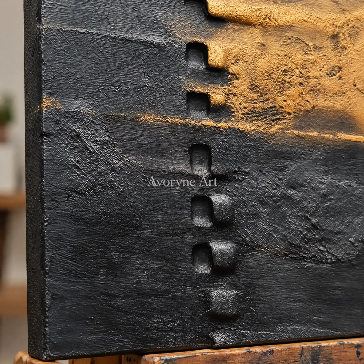 Close-up of the hand-painted texture of Quiet Refrain dark mineral relief wall art on an easel