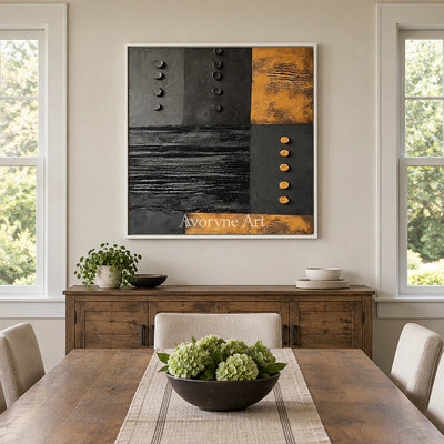 Quiet Haven dark mineral relief wall art with a white frame in a dining room