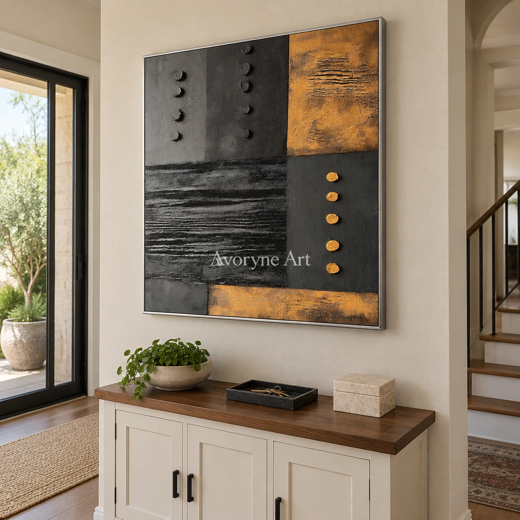 Quiet Haven dark mineral relief wall art with a silver frame in an entryway