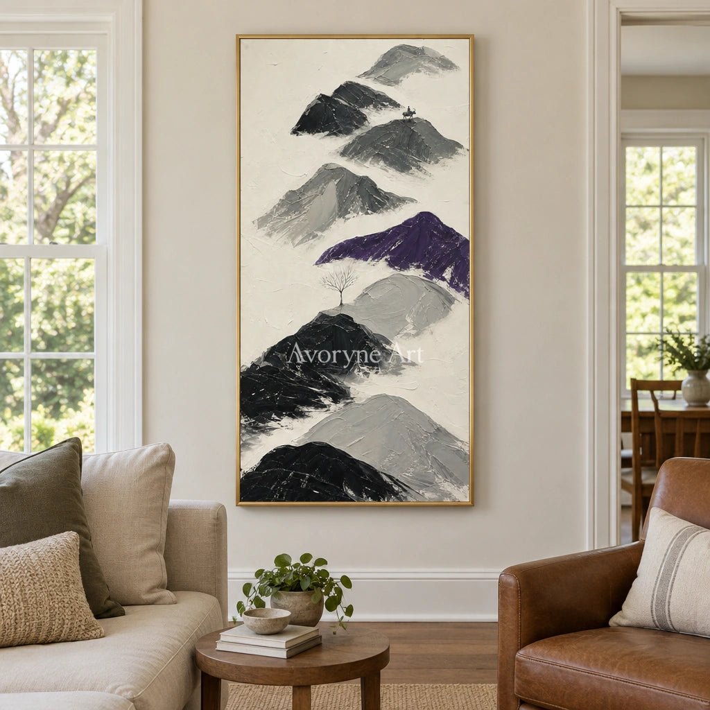 Misted Echo dark mountain relief wall art with a gold frame hanging in a living room
