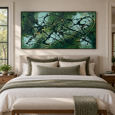 Golden Solace drip abstract wall art with a black frame above a bed in a bedroom