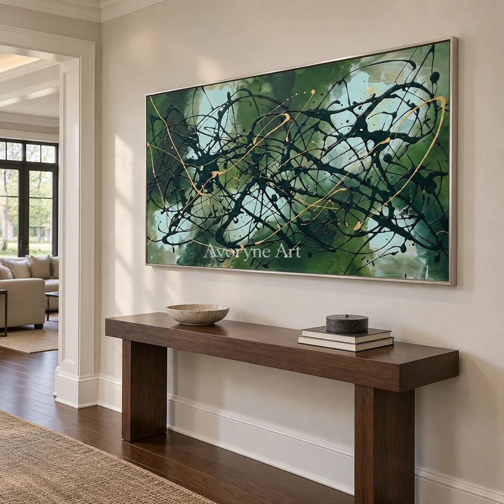 Golden Solace drip abstract wall art with a silver frame in an entryway