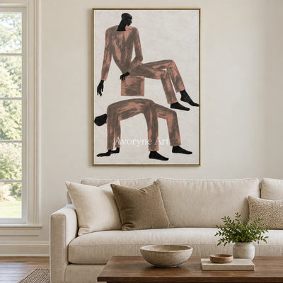 Lucent Mosaic dynamic figure wall art with a gold frame hanging in a living room