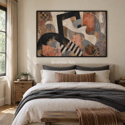 Woven Drift earth geometric art with a black frame above a bed in a bedroom