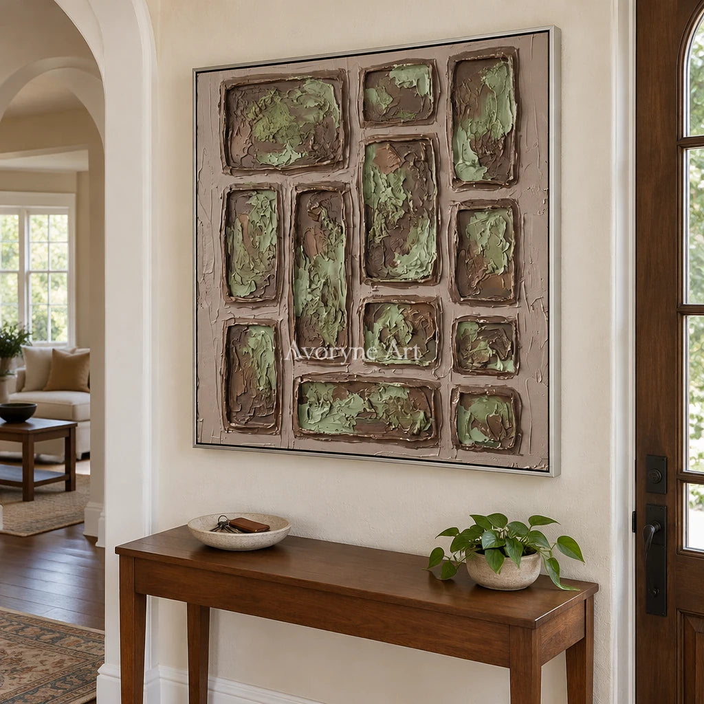Misted Sonata earth grid relief wall art with a silver frame in an entryway