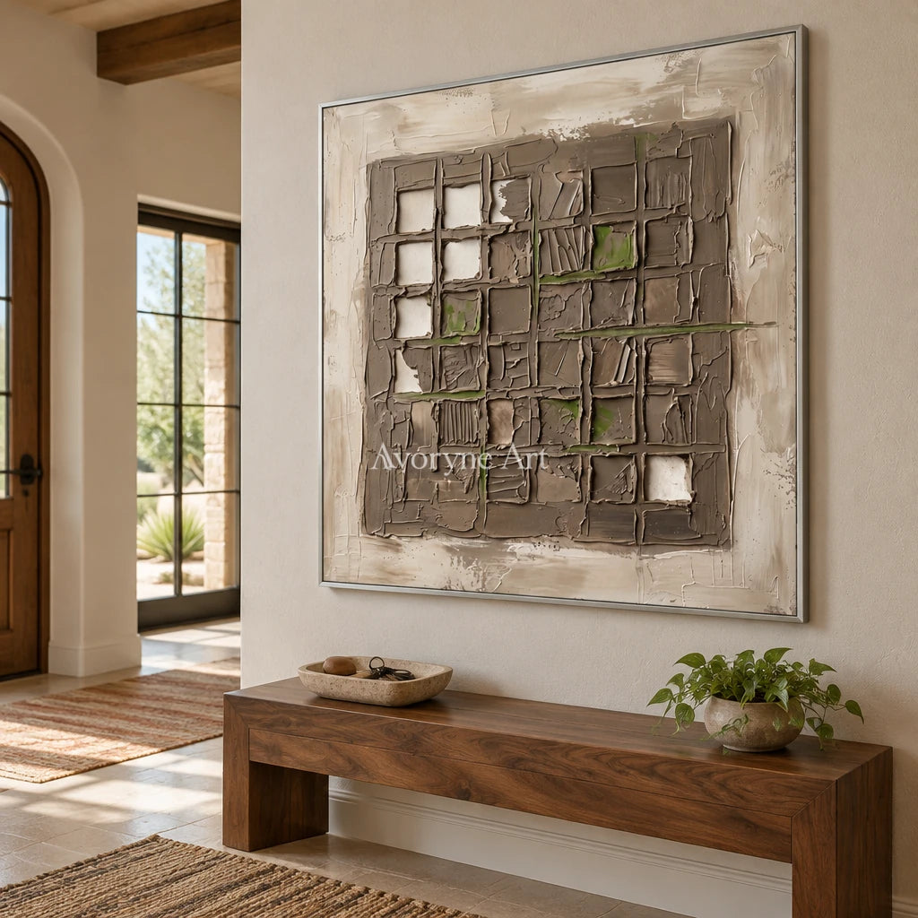 Weathered Horizon earth grid relief wall art with a silver frame in an entryway