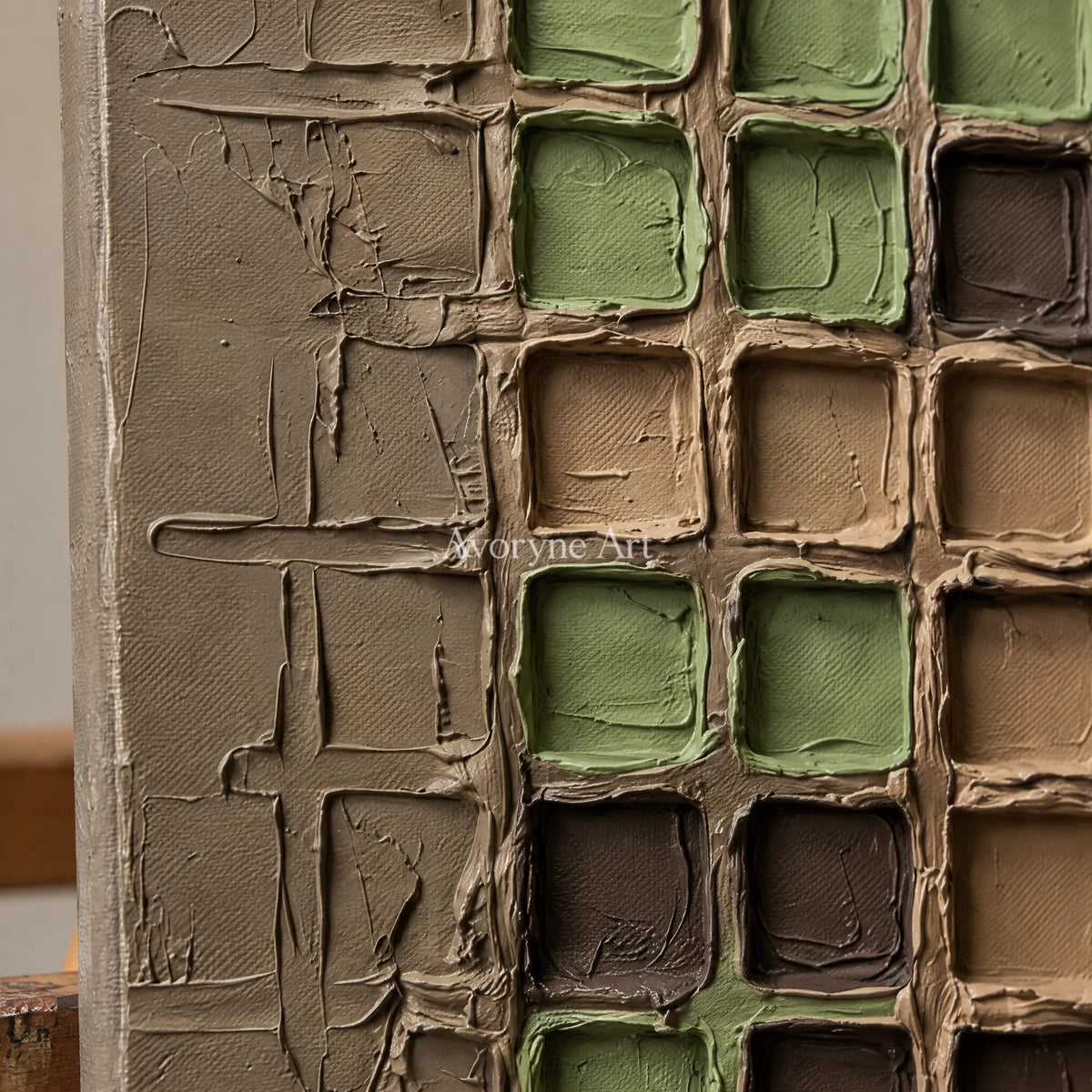 Close-up of the hand-painted texture of Weathered Verse earth grid relief wall art on an easel