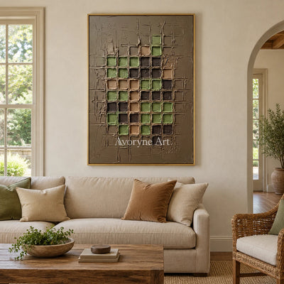 Weathered Verse earth grid relief wall art with a gold frame hanging in a living room