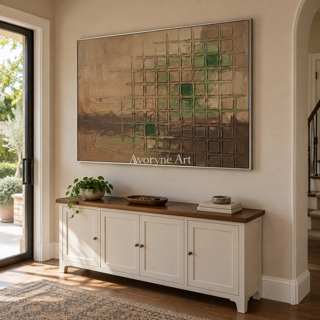 Earthen Horizon earth grid relief wall art with a silver frame in an entryway