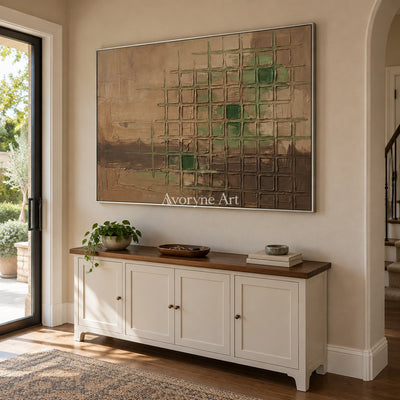 Earthen Horizon earth grid relief wall art with a silver frame in an entryway