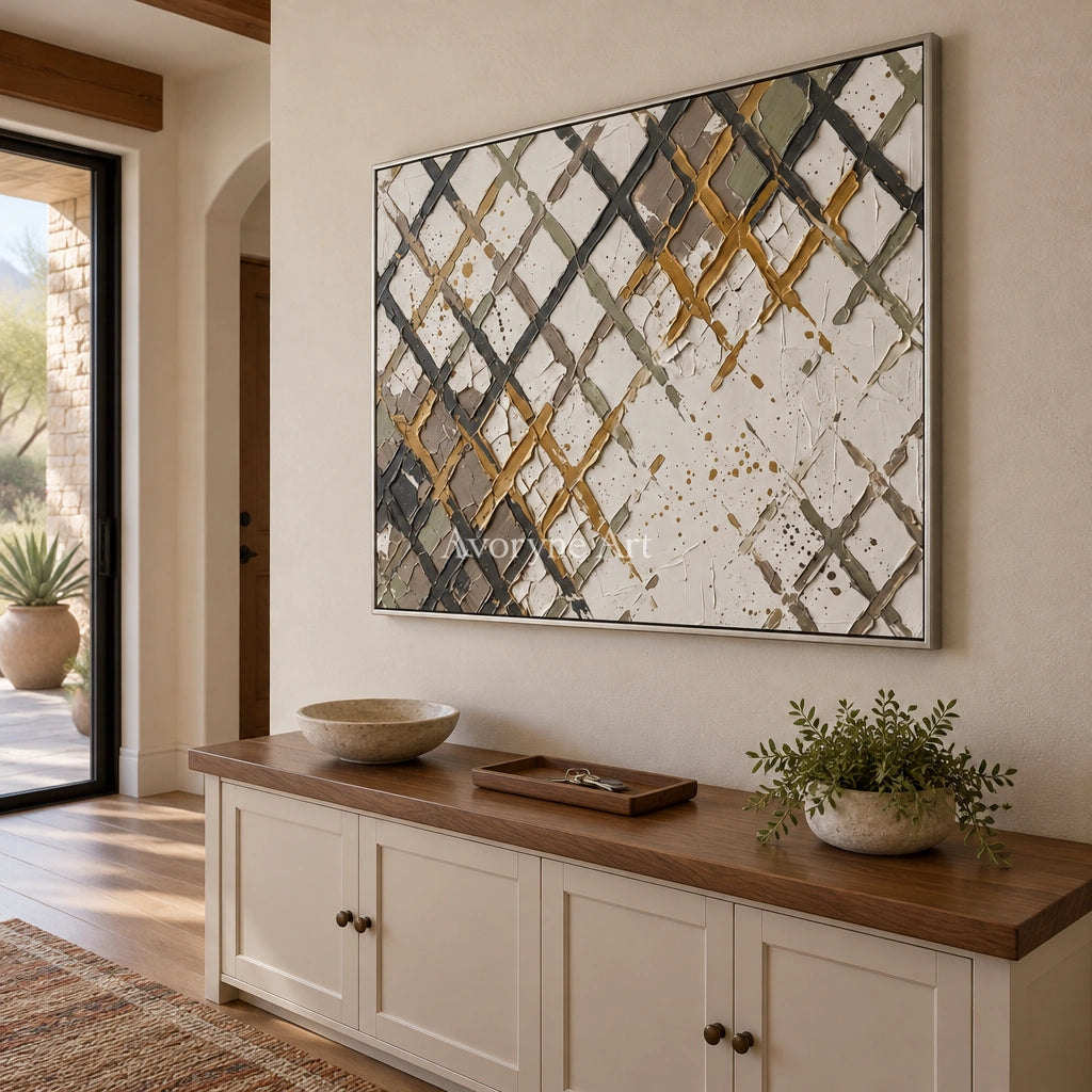 Earthen Measure earth grid texture wall art with a silver frame in an entryway