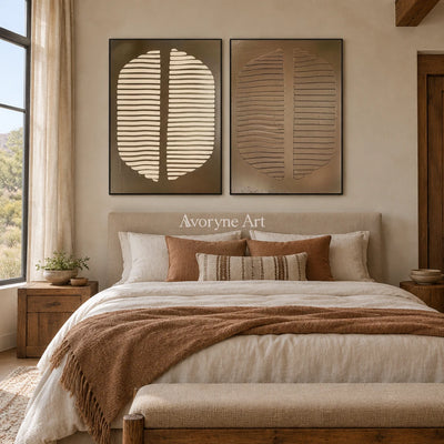 Muted Measure earth grooved curves diptych with a black frame above a bed in a bedroom