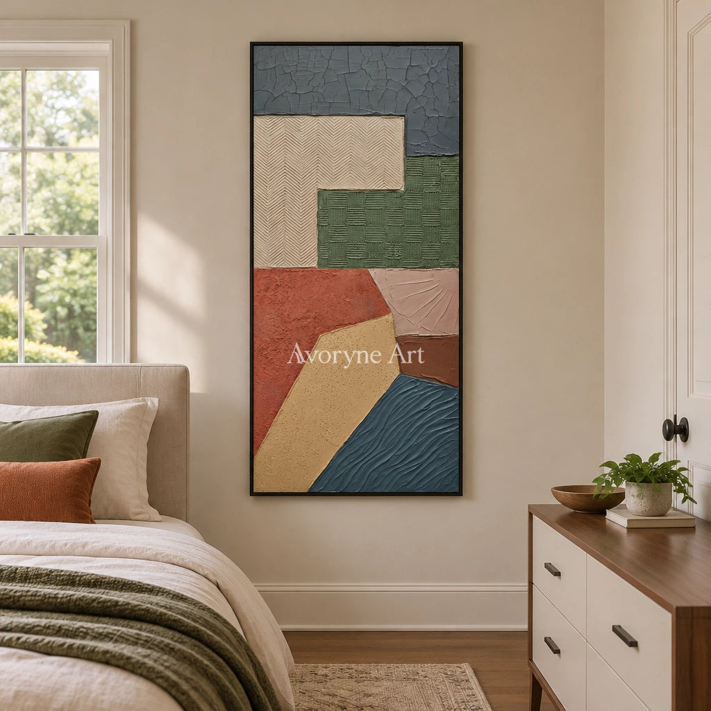 Mineral Current earth patch texture wall art with a black frame above a bed in a bedroom