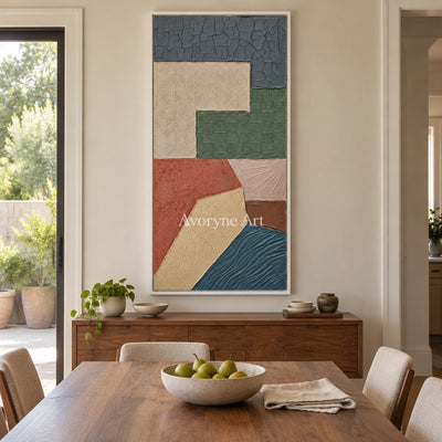 Mineral Current earth patch texture wall art with a white frame in a dining room