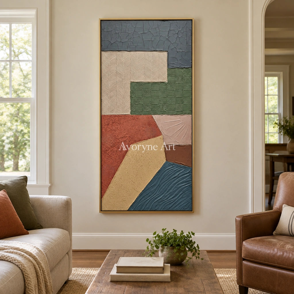 Mineral Current earth patch texture wall art with a gold frame hanging in a living room