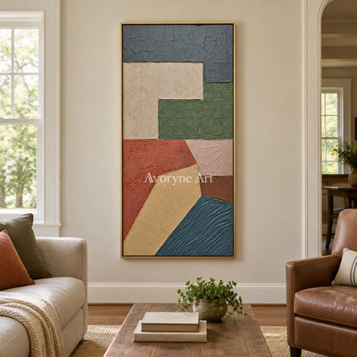 Mineral Current earth patch texture wall art with a gold frame hanging in a living room