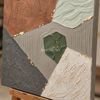 Close-up of the hand-painted texture of Still Measure earth patch texture wall art on an easel