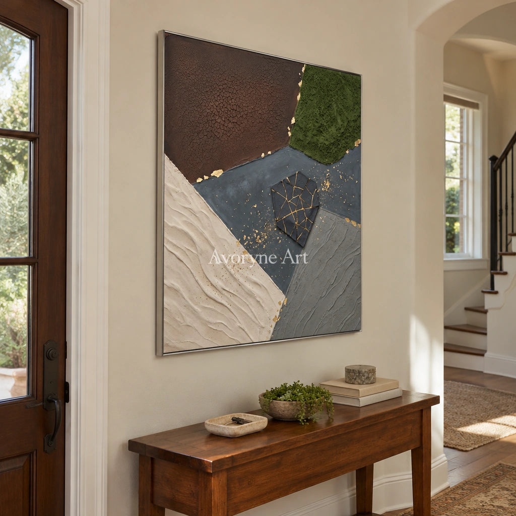 Still Sonata earth patch texture wall art with a silver frame in an entryway