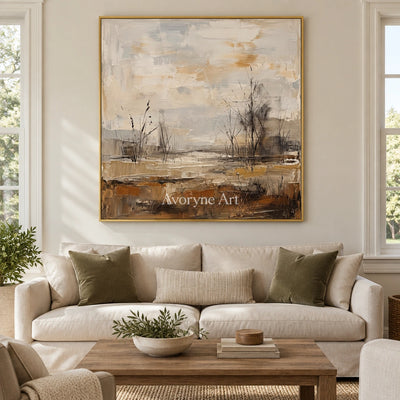 Bright Mosaic earth tone landscape wall art with a gold frame hanging in a living room