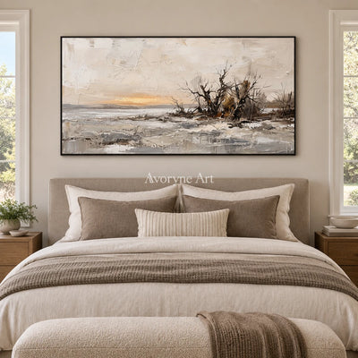 Bright Drift earth tone landscape wall art with a black frame above a bed in a bedroom