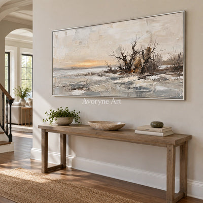 Bright Drift earth tone landscape wall art with a silver frame in an entryway