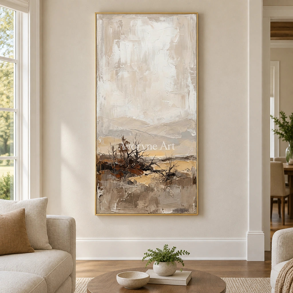Bright Verse earth tone landscape wall art with a gold frame hanging in a living room