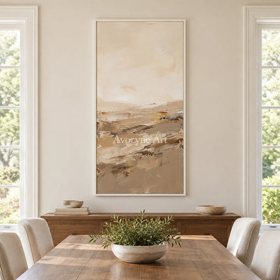 Bright Vista earth tone landscape wall art with a white frame in a dining room