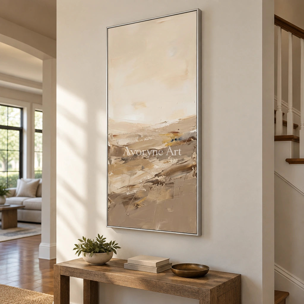 Bright Vista earth tone landscape wall art with a silver frame in an entryway