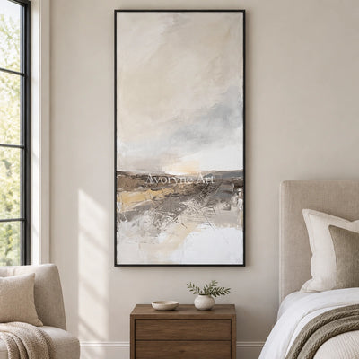 Bright Reverberation earth tone landscape wall art with a black frame above a bed in a bedroom