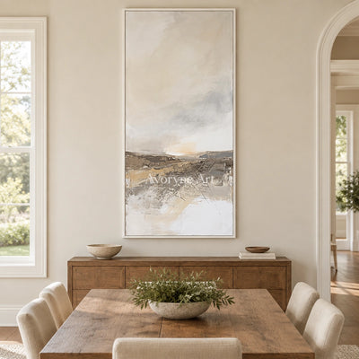 Bright Reverberation earth tone landscape wall art with a white frame in a dining room