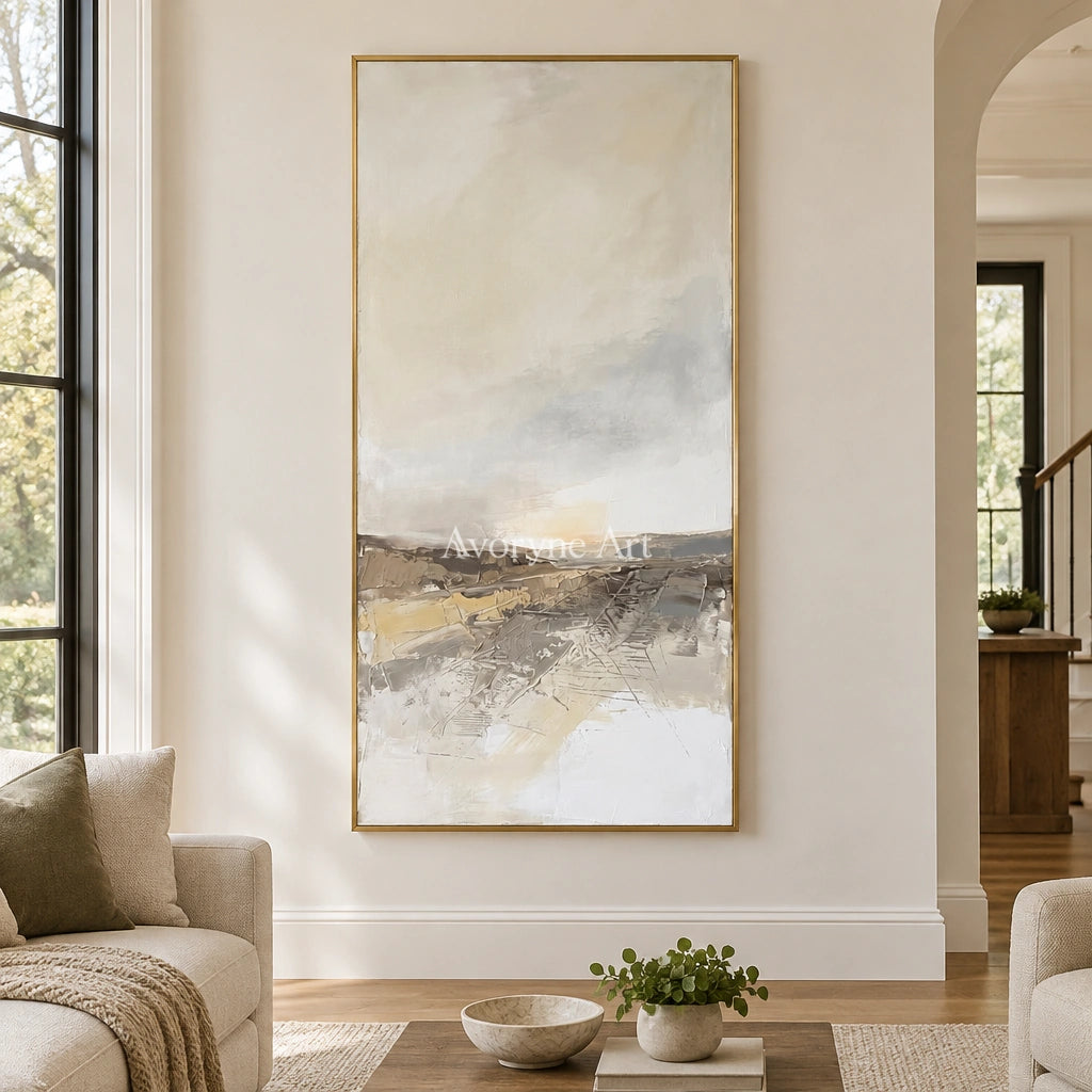 Bright Reverberation earth tone landscape wall art with a gold frame hanging in a living room