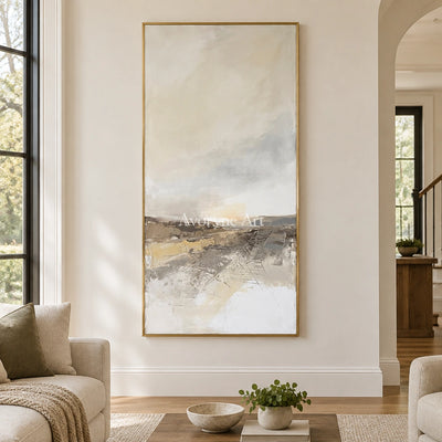 Bright Reverberation earth tone landscape wall art with a gold frame hanging in a living room