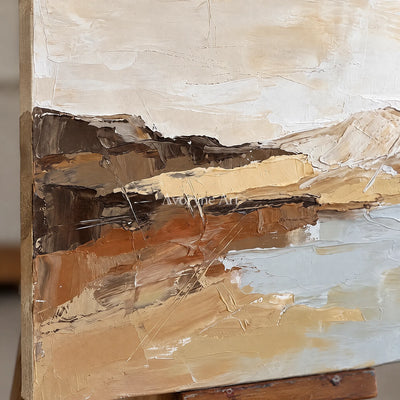 Close-up of the hand-painted texture of Bright Dialogue earth tone landscape wall art on an easel