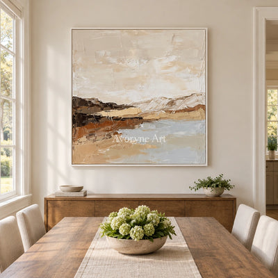 Bright Dialogue earth tone landscape wall art with a white frame in a dining room