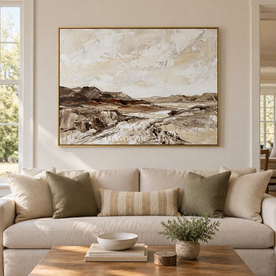Winding Cadence earth tone landscape wall art with a gold frame hanging in a living room