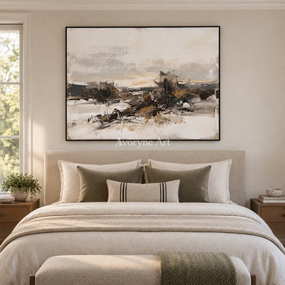 Winding Interval earth tone landscape wall art with a black frame above a bed in a bedroom