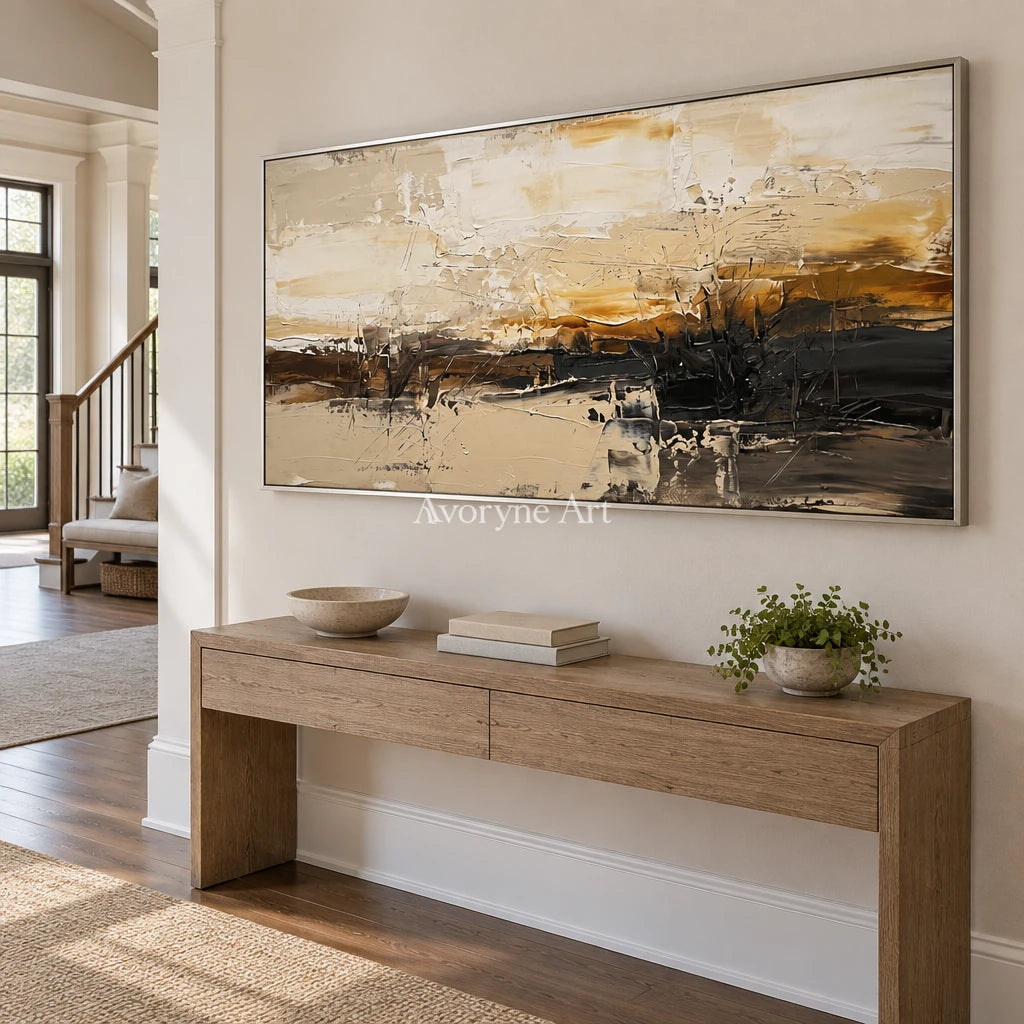 Winding Echo earth tone landscape wall art with a silver frame in an entryway