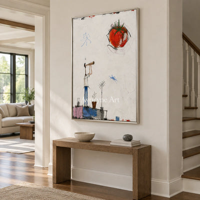 Warm Gesture everyday character wall art with a silver frame in an entryway
