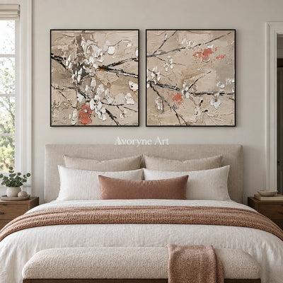 Quiet Horizon floral branch diptych with a black frame above a bed in a bedroom