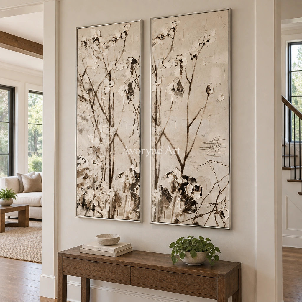 Quiet Drift floral branch diptych with a silver frame in an entryway