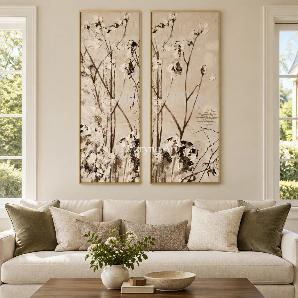 Quiet Drift floral branch diptych with a gold frame hanging in a living room