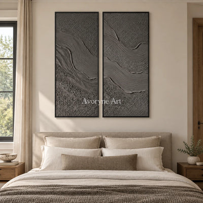 Quiet Prelude flowing relief diptych with a black frame above a bed in a bedroom