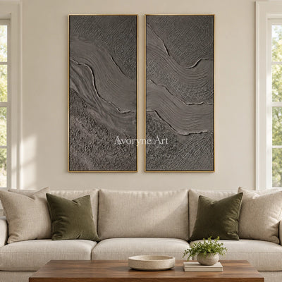 Quiet Prelude flowing relief diptych with a gold frame hanging in a living room