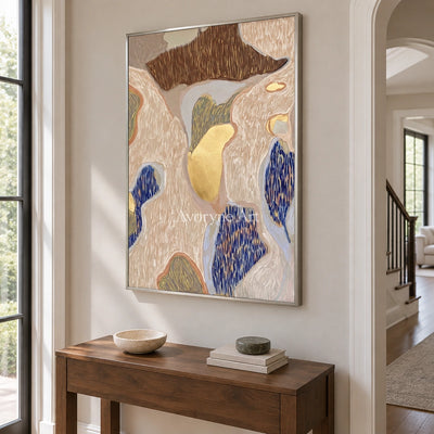 Winding Drift geometric texture wall art with a silver frame in an entryway
