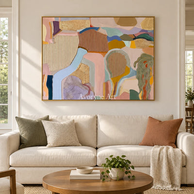 Winding Story geometric texture wall art with a gold frame hanging in a living room