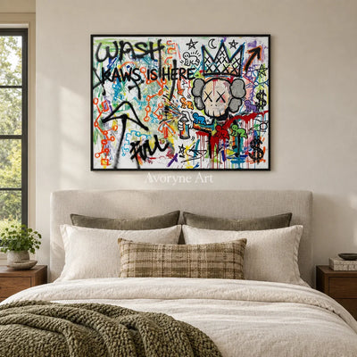 Hidden Interval graffiti figure wall art with a black frame above a bed in a bedroom