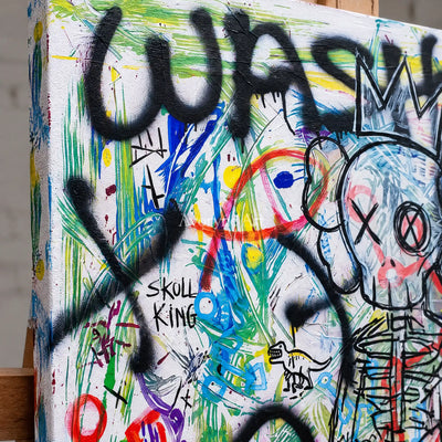 Close-up of the hand-painted texture of Hidden Echo graffiti figure wall art on an easel