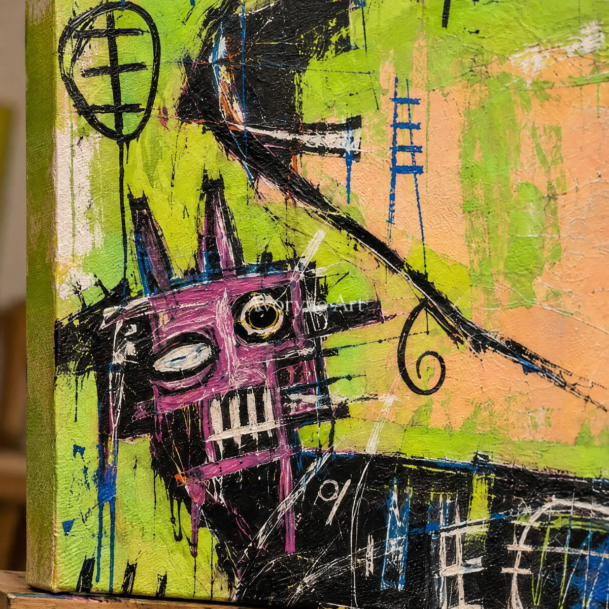 Close-up of the hand-painted texture of Hidden Dialogue graffiti figure wall art on an easel
